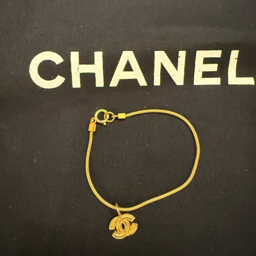 CHANEL Gold Bracelet with Iconic Charm